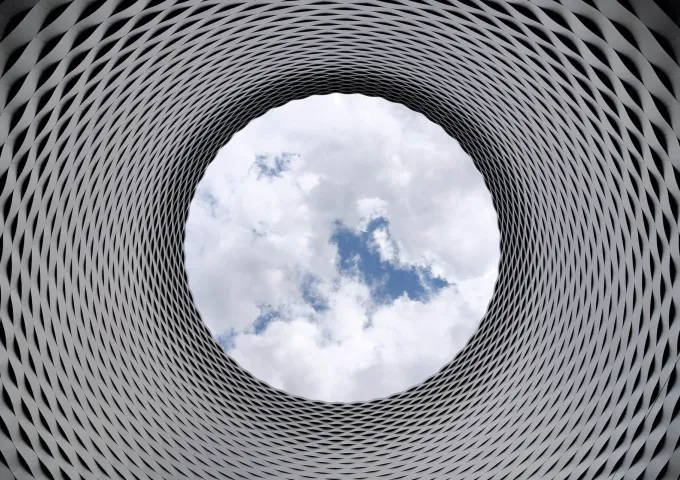 DevOps and agile the year ahead against an aperture with blue sky
